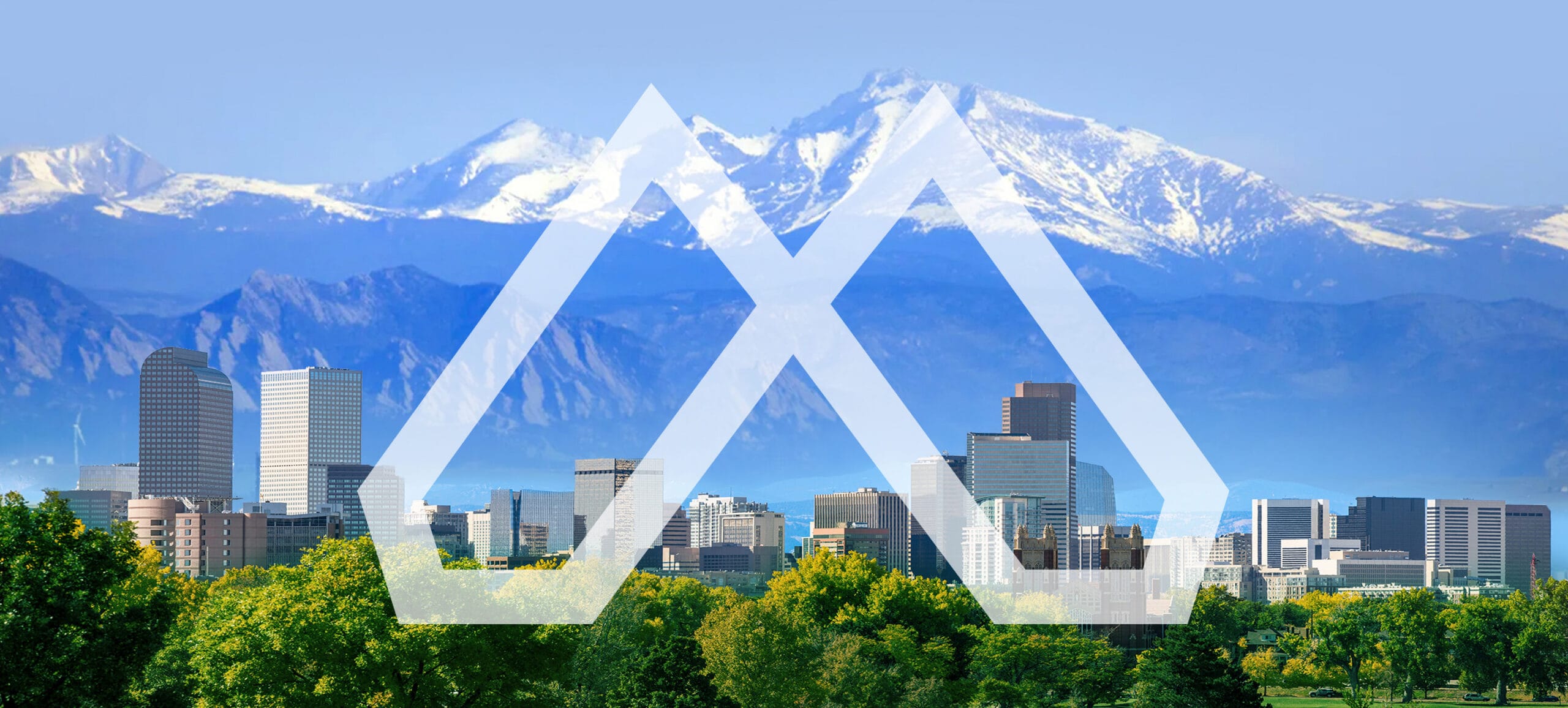 Mountain landscape photograph with McCoy logo overlaid